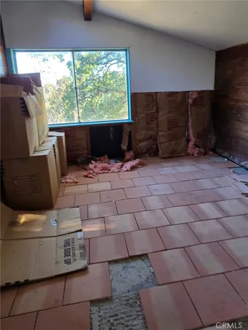a view of a livingroom with furniture and window