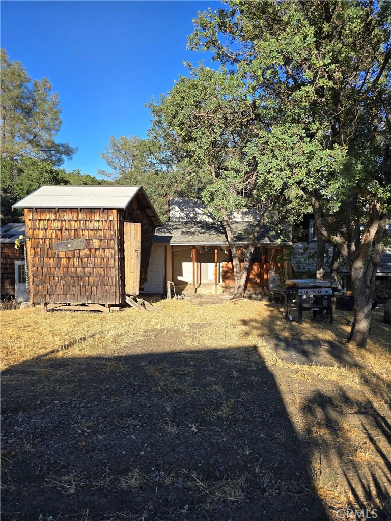 728 Watertrough Road Clearlake Oaks, CA 95423 - Photo 15 of 17 a view of a house with a yard