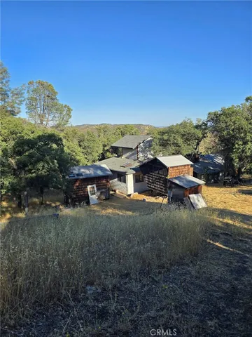 a view of city and mountain in the distance