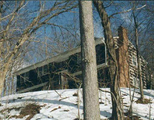 6 Druid Lane Ridgefield, CT 06877 - Photo 1 of 1 a backyard of a house with large trees