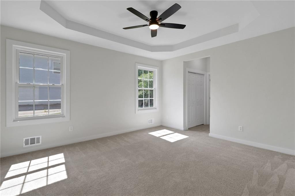 6259 Spring Lake Drive Flowery Branch, GA 30542 - Photo 8 of 35 a view of an empty room with a window