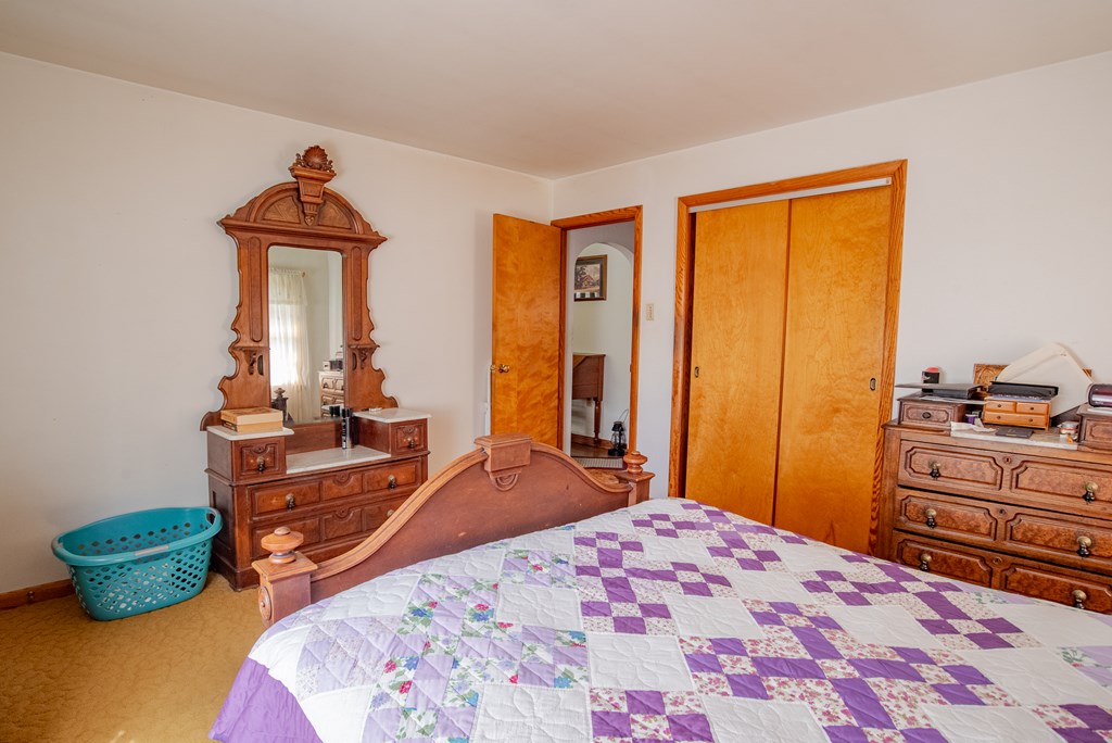 469 Terwilliger Road Parker, PA 16049 - Photo 39 of 47 a bedroom with a bed and a dresser in it
