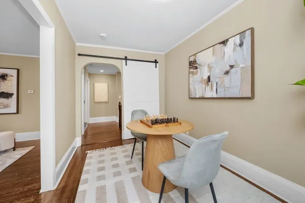 a room with furniture and wooden floor