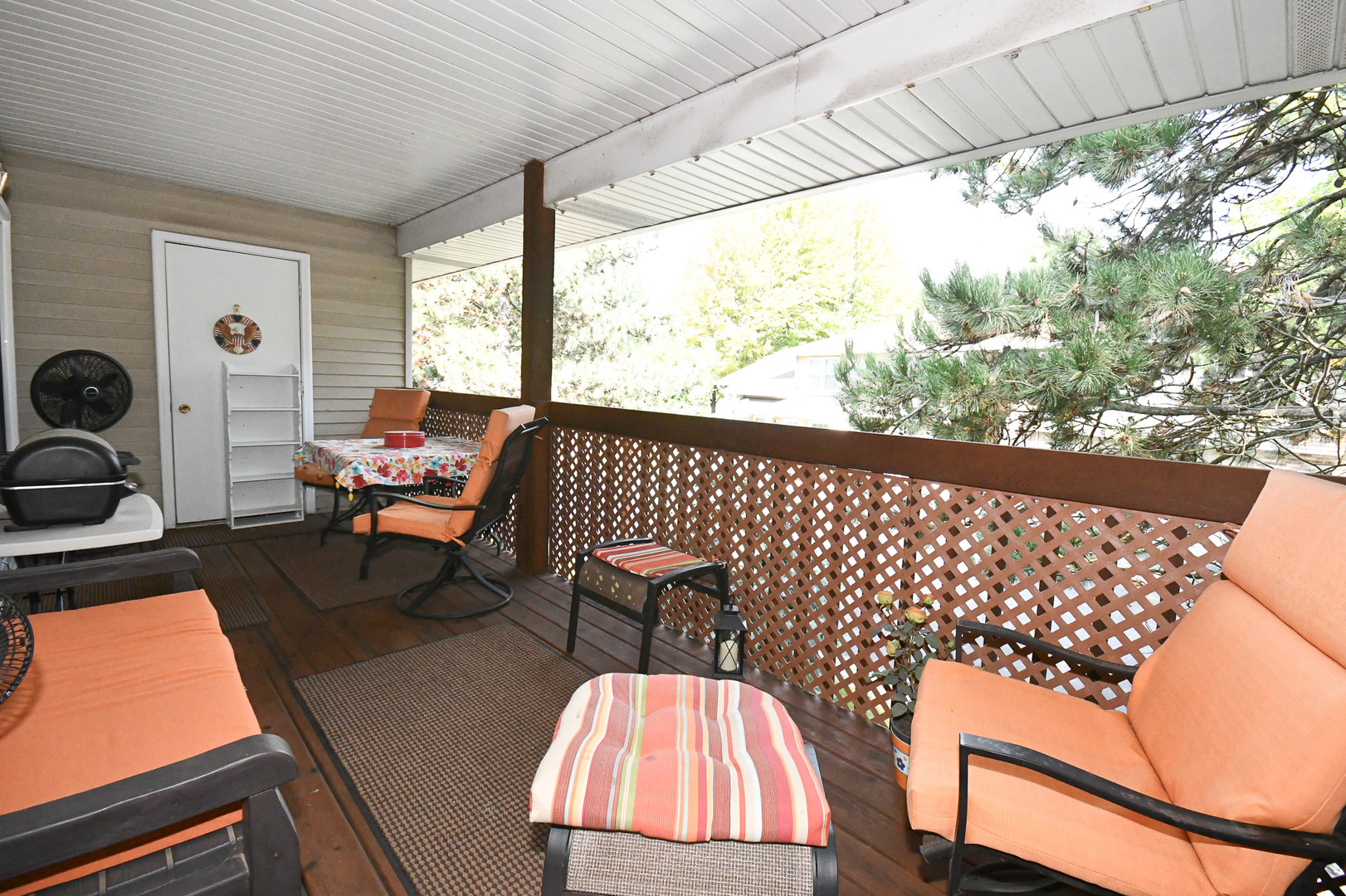 960 Elderberry Circle, Unit 108 Naperville, IL 60563 - Photo 29 of 32 a view of a chairs and table in a balcony