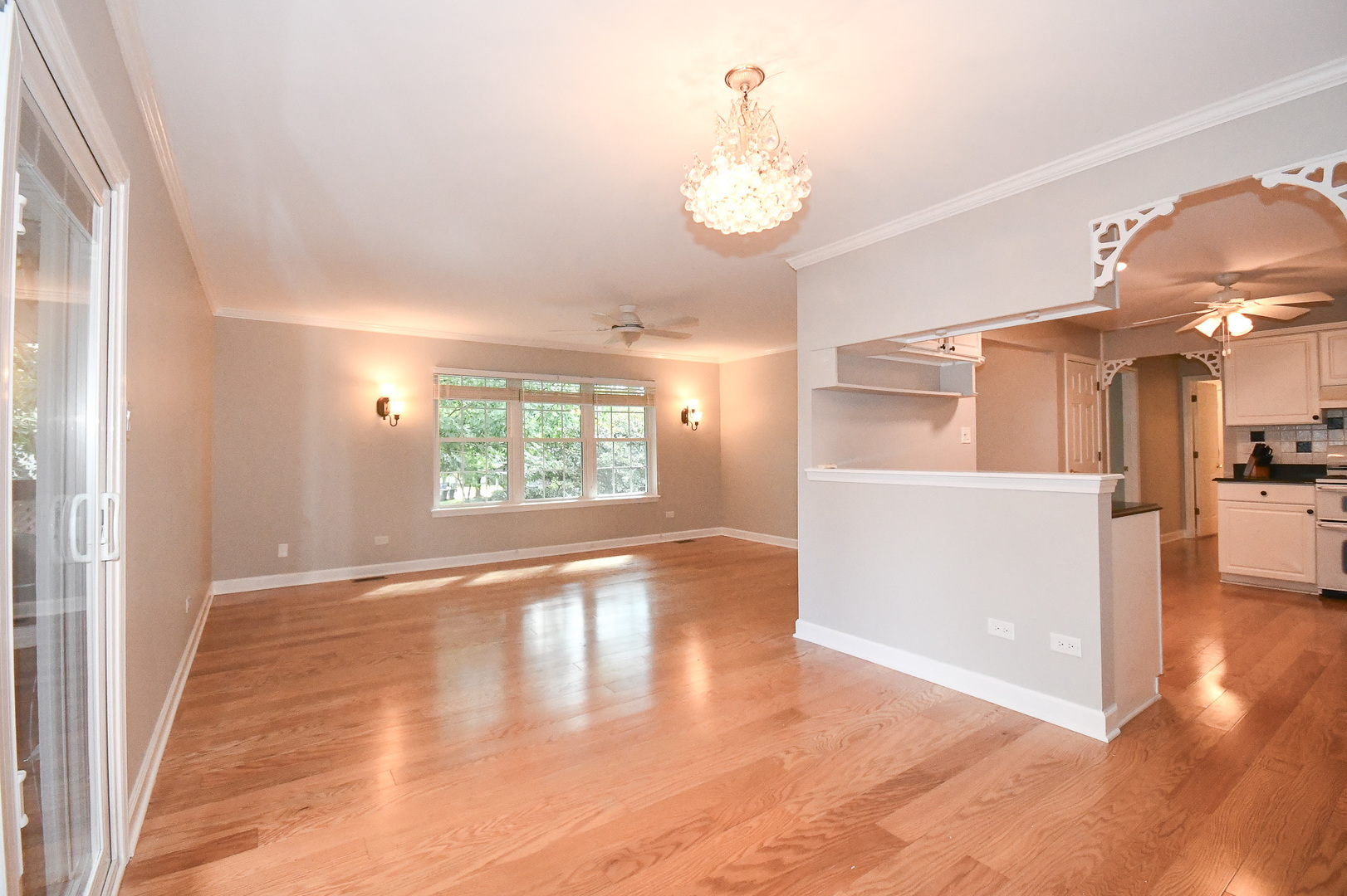 960 Elderberry Circle, Unit 108 Naperville, IL 60563 - Photo 7 of 32 a view of a living room and kitchen with a window