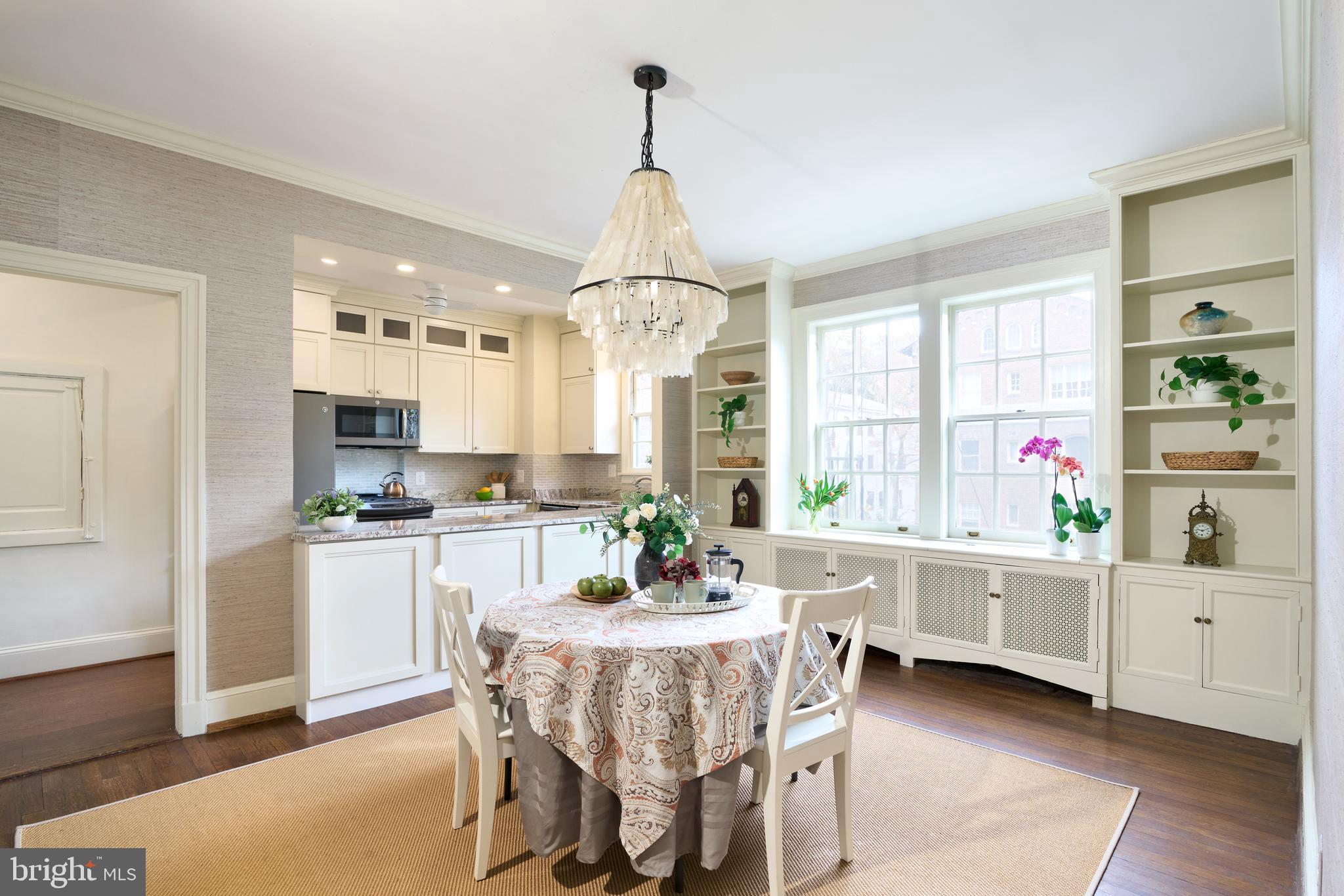 221 Stony Run Lane, Unit J2 Baltimore, MD 21210 - Photo 11 of 31 a dining room with furniture and window