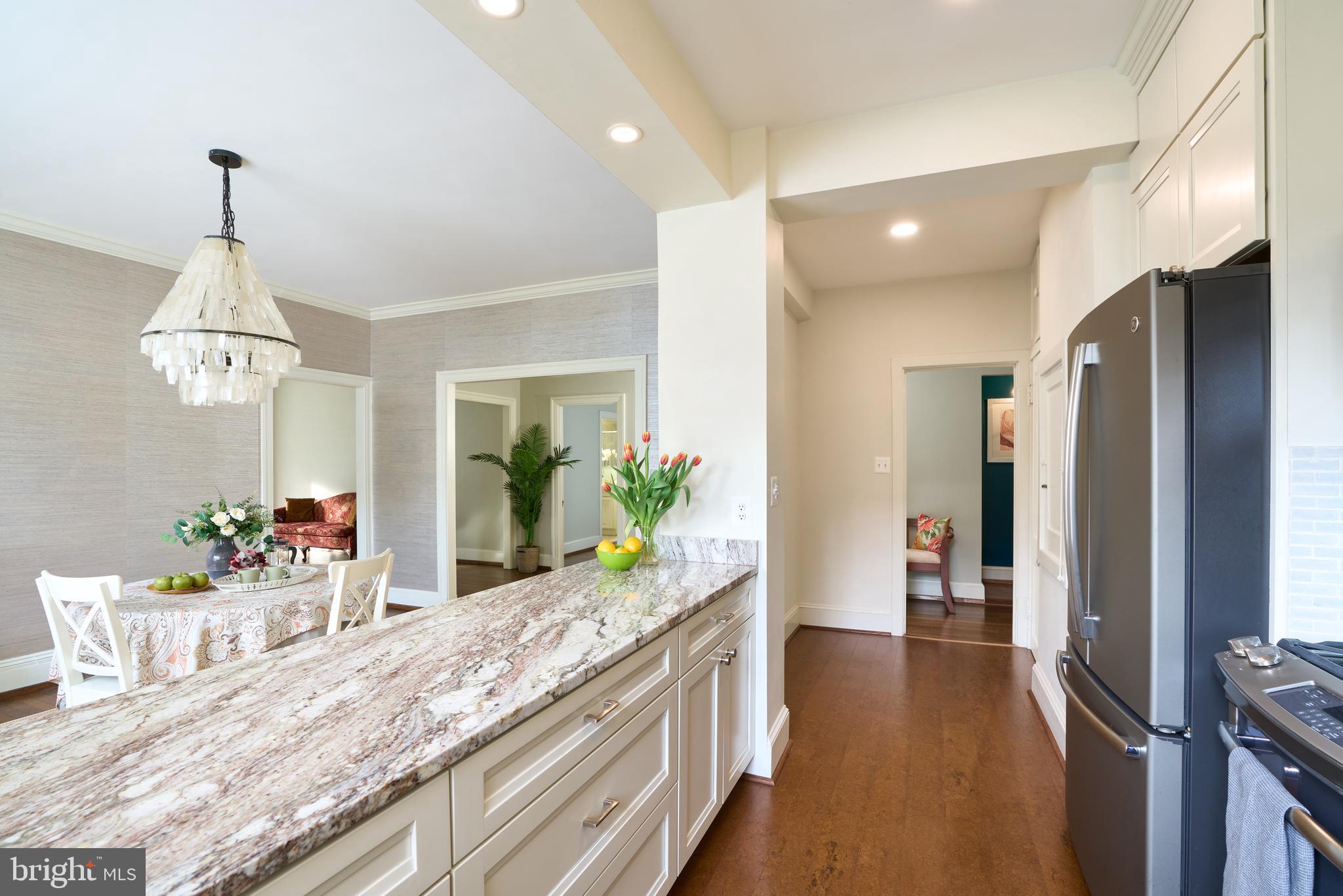 221 Stony Run Lane, Unit J2 Baltimore, MD 21210 - Photo 13 of 31 a view of a kitchen and dining room