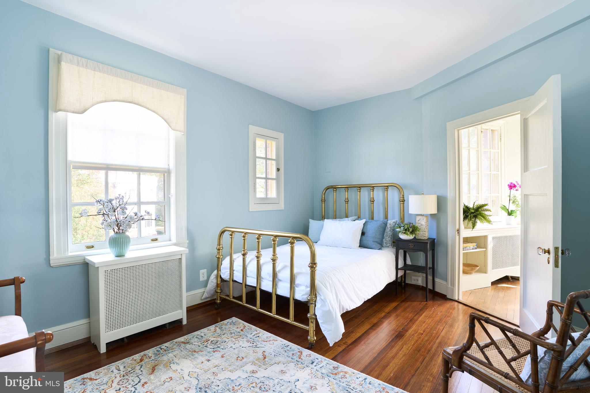 221 Stony Run Lane, Unit J2 Baltimore, MD 21210 - Photo 23 of 31 a bedroom with a bed and a window