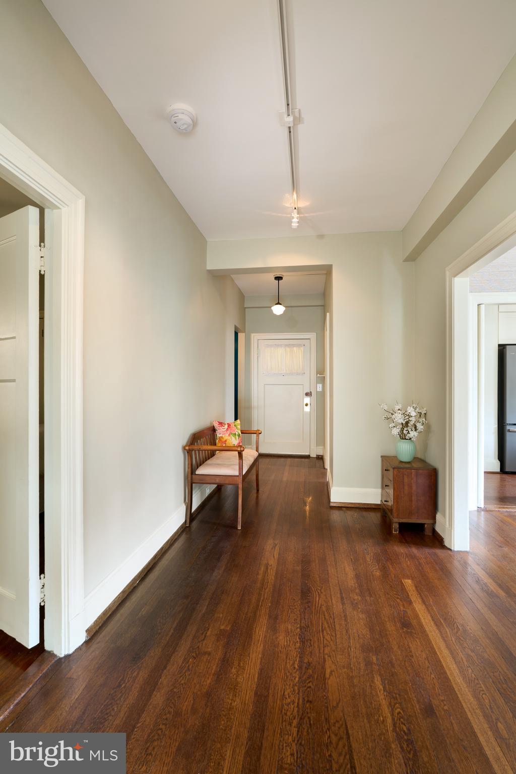 221 Stony Run Lane, Unit J2 Baltimore, MD 21210 - Photo 29 of 31 a view of livingroom with furniture and wooden floor