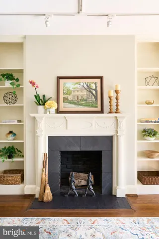 a living room with a fireplace