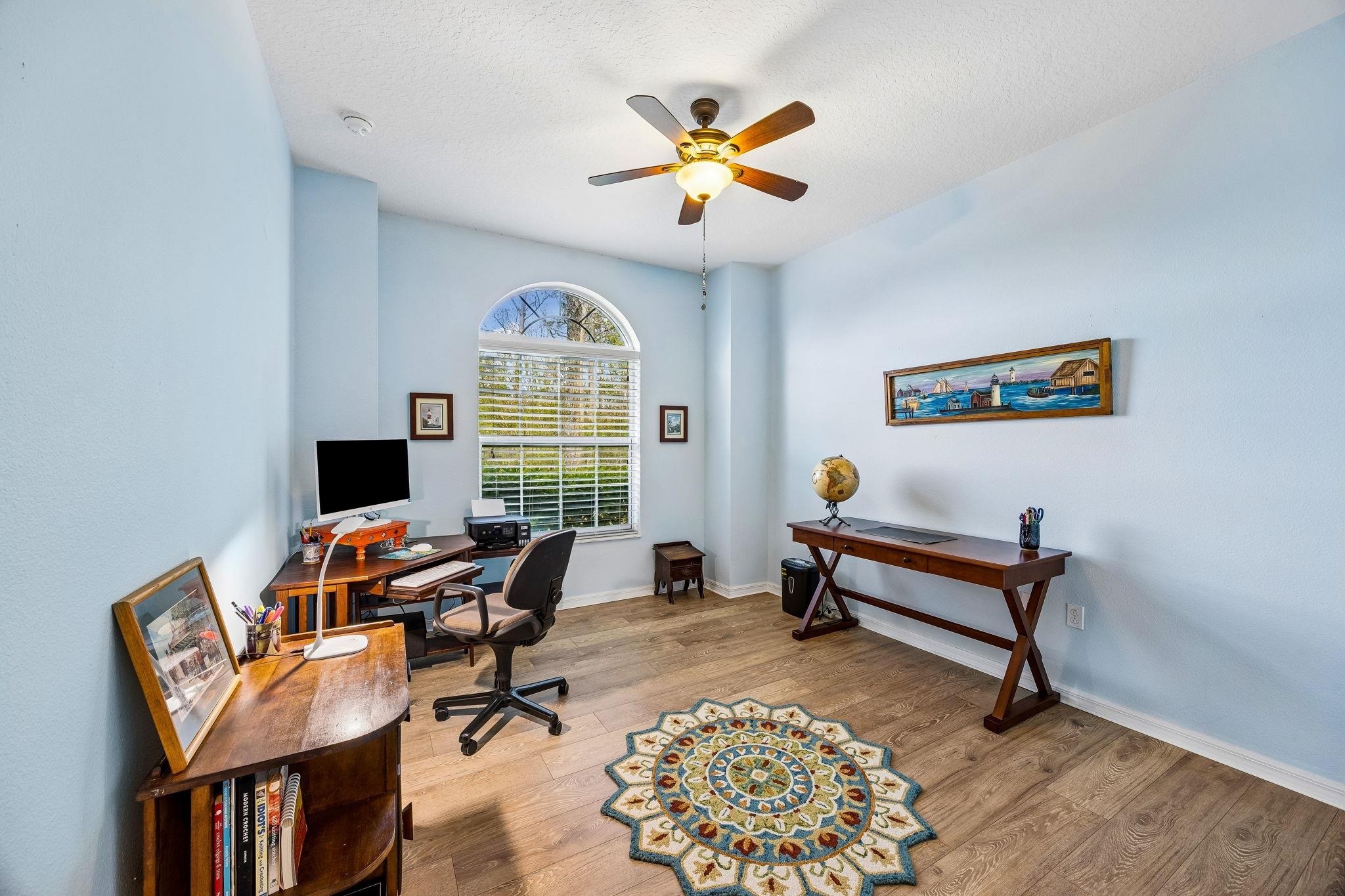 133 South Twin Maple Road St. Augustine, FL 32084 - Photo 19 of 34 a living room with furniture a window and a flat screen tv