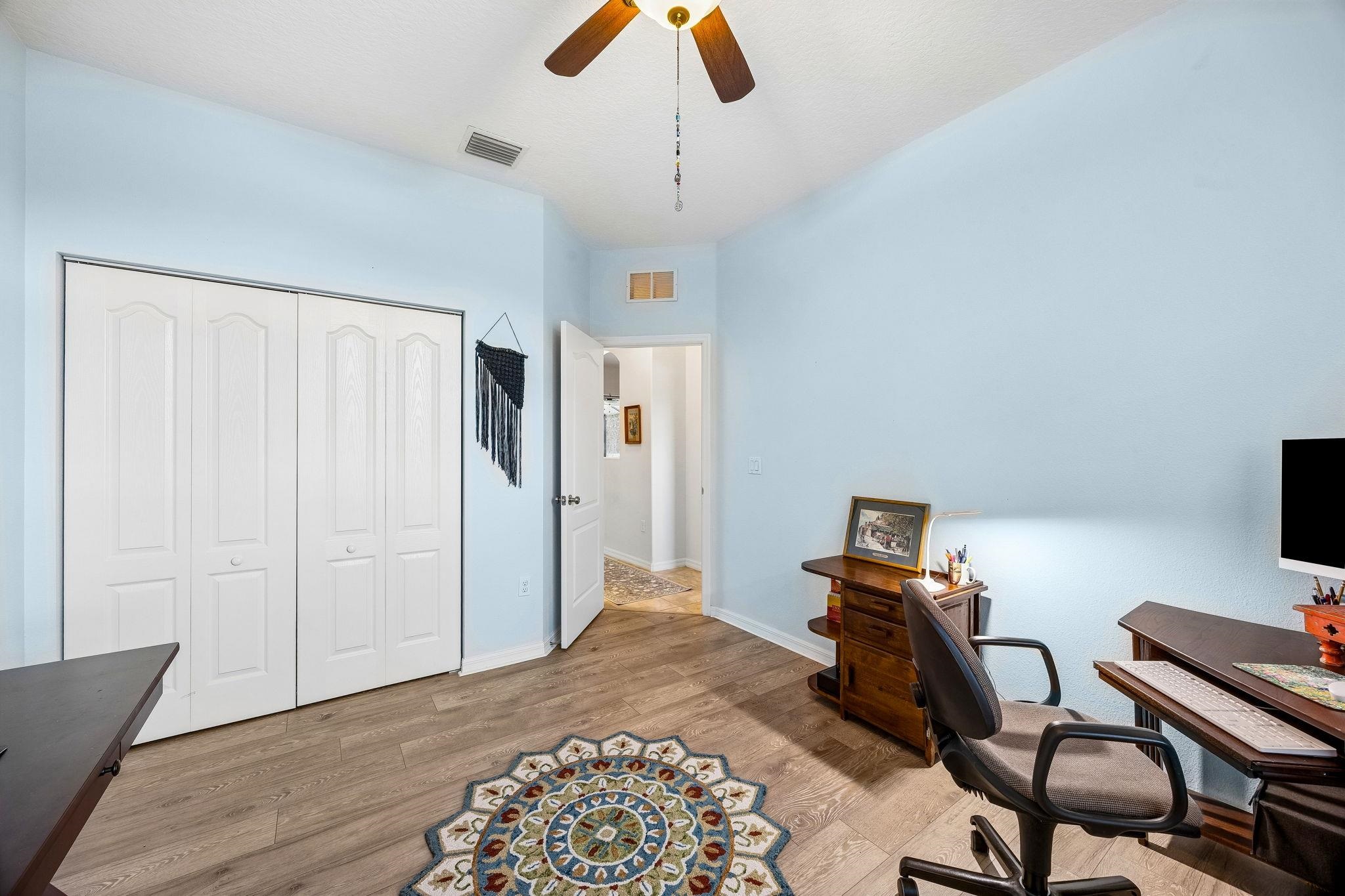 133 South Twin Maple Road St. Augustine, FL 32084 - Photo 20 of 34 a room with furniture and a flat screen tv