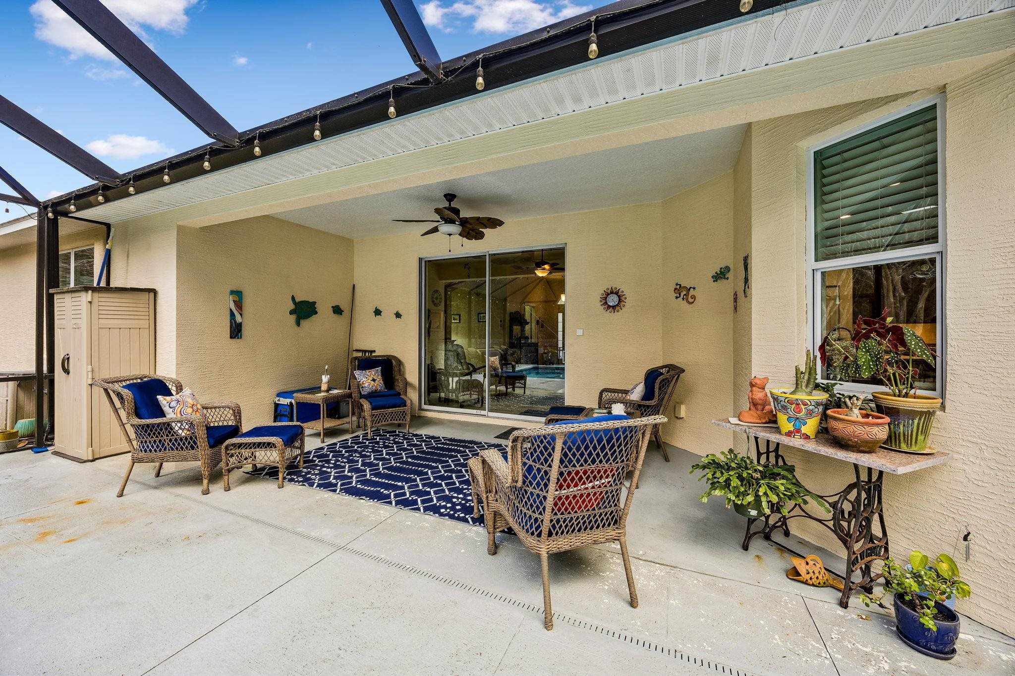 133 South Twin Maple Road St. Augustine, FL 32084 - Photo 26 of 34 View of patio / terrace with a lanai and a ceiling fan