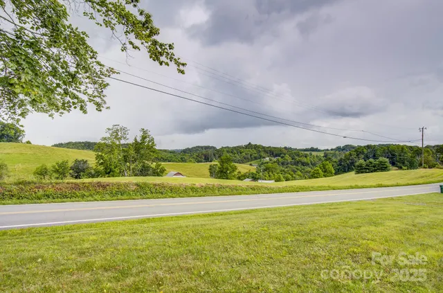 a view of an ocean and a mountain