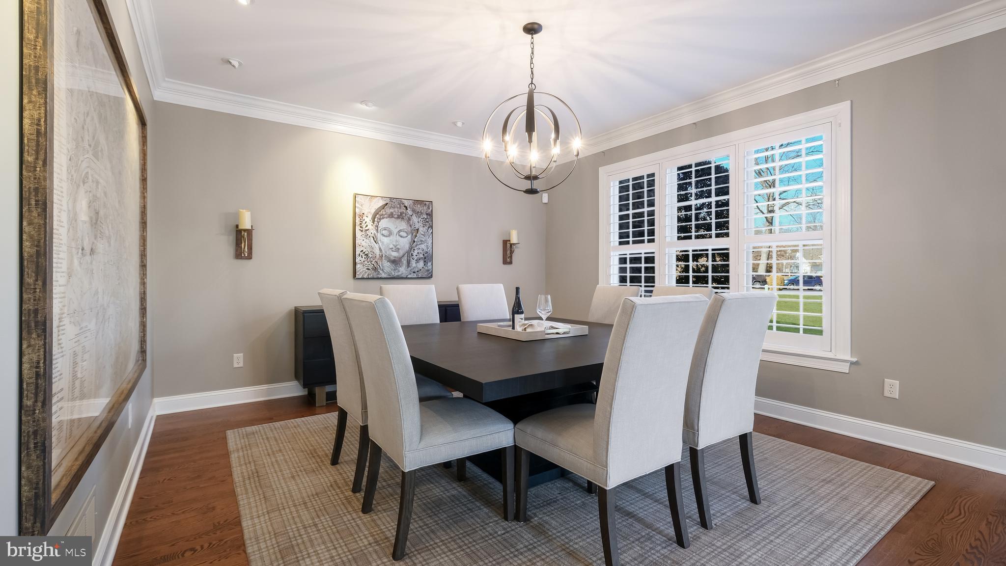 12 Garden Path Doylestown, PA 18901 - Photo 11 of 58 a view of a dining room with furniture window and wooden floor