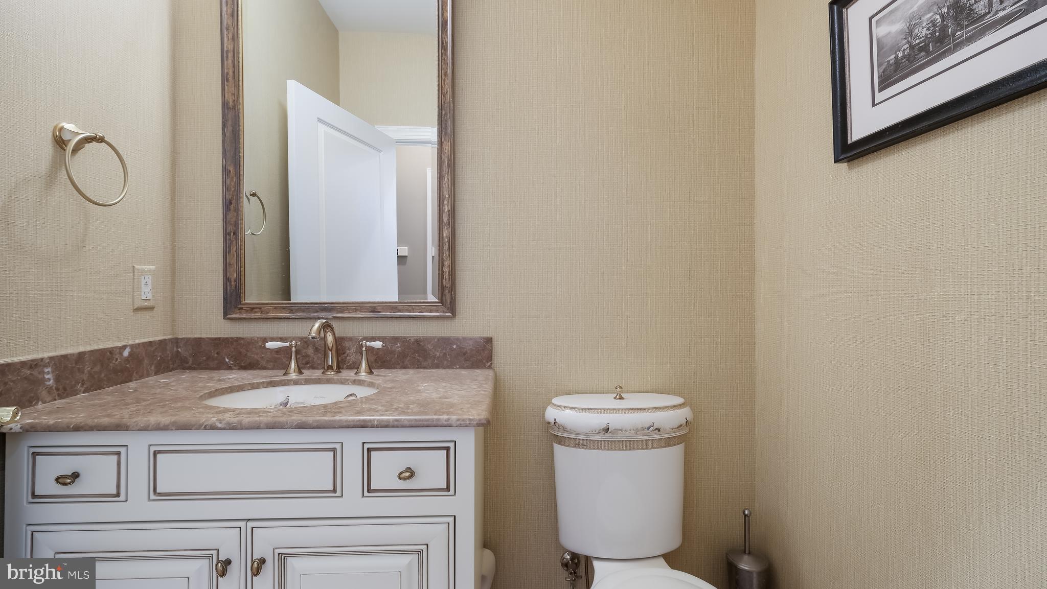 12 Garden Path Doylestown, PA 18901 - Photo 20 of 58 a bathroom with a granite countertop toilet sink and mirror