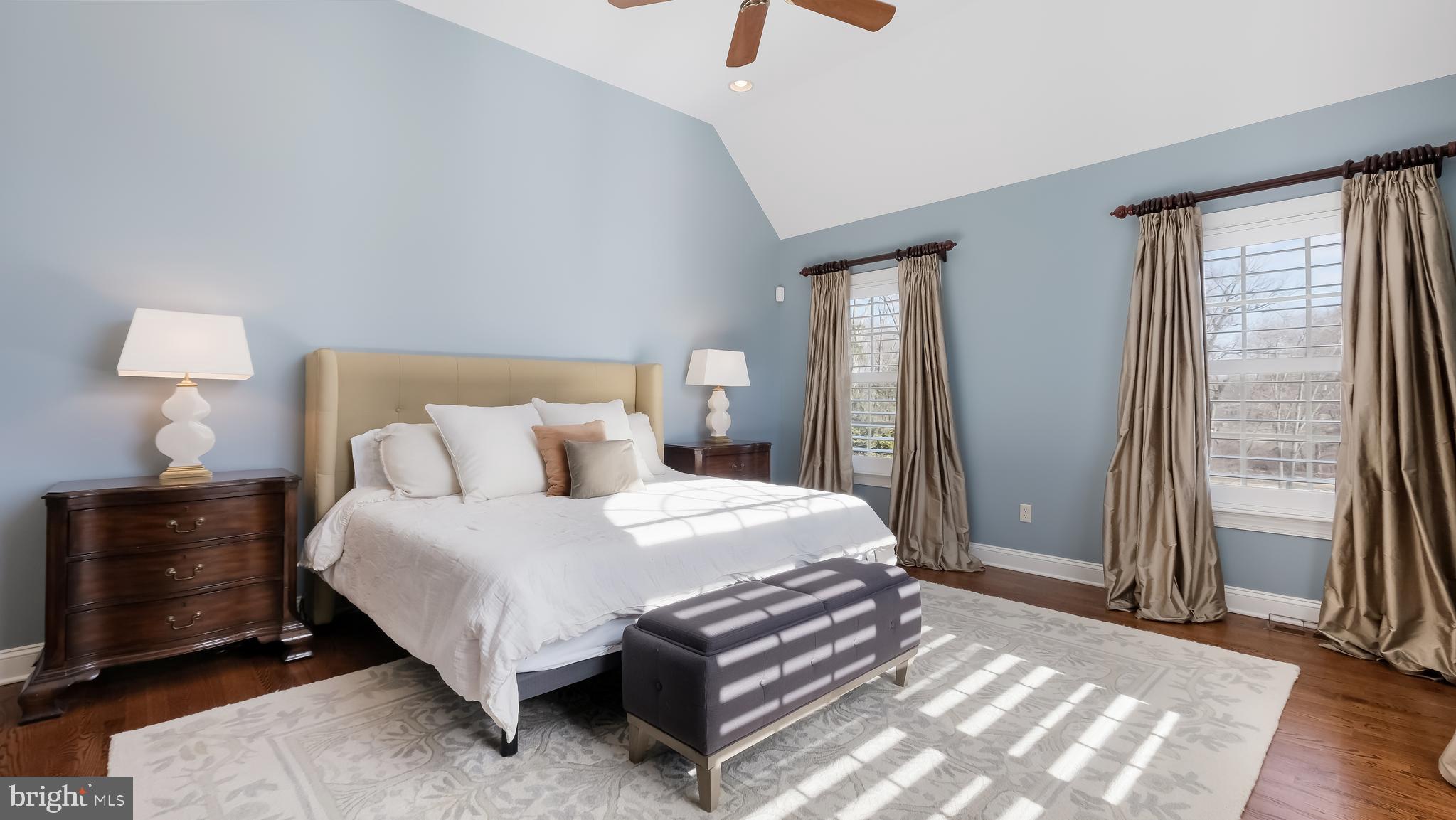 12 Garden Path Doylestown, PA 18901 - Photo 26 of 58 a bedroom with a bed a lamp and a large window