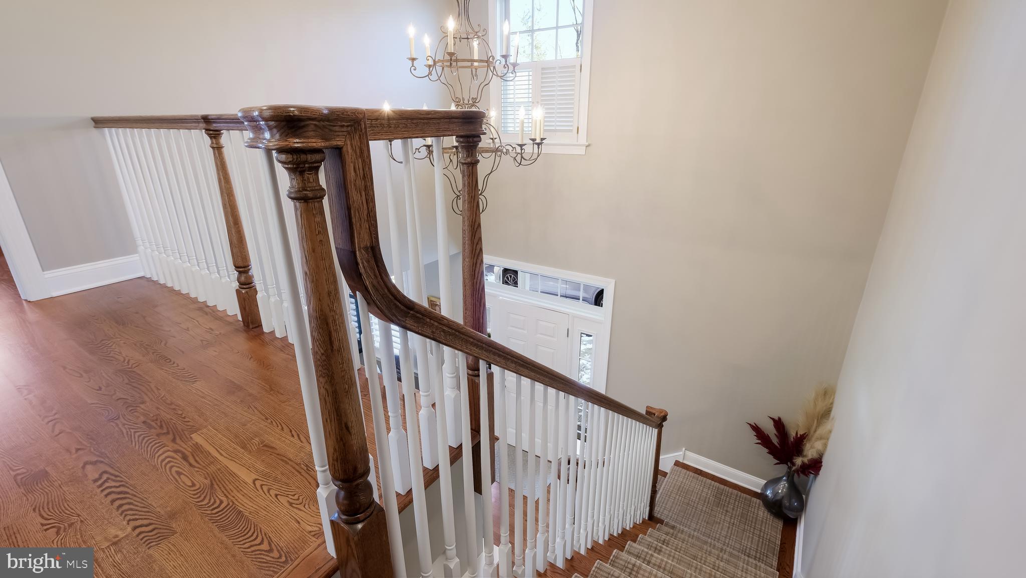 12 Garden Path Doylestown, PA 18901 - Photo 31 of 58 a view of a staircase with wooden floor and stairs