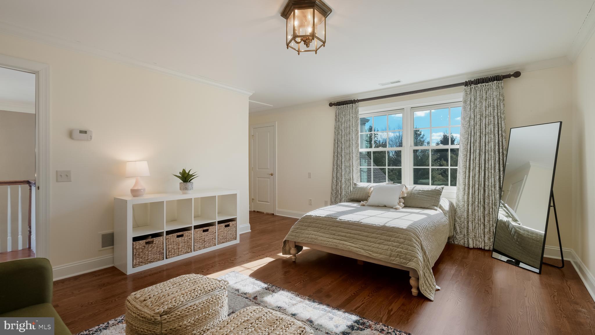 12 Garden Path Doylestown, PA 18901 - Photo 36 of 58 a bedroom with a bed and a window