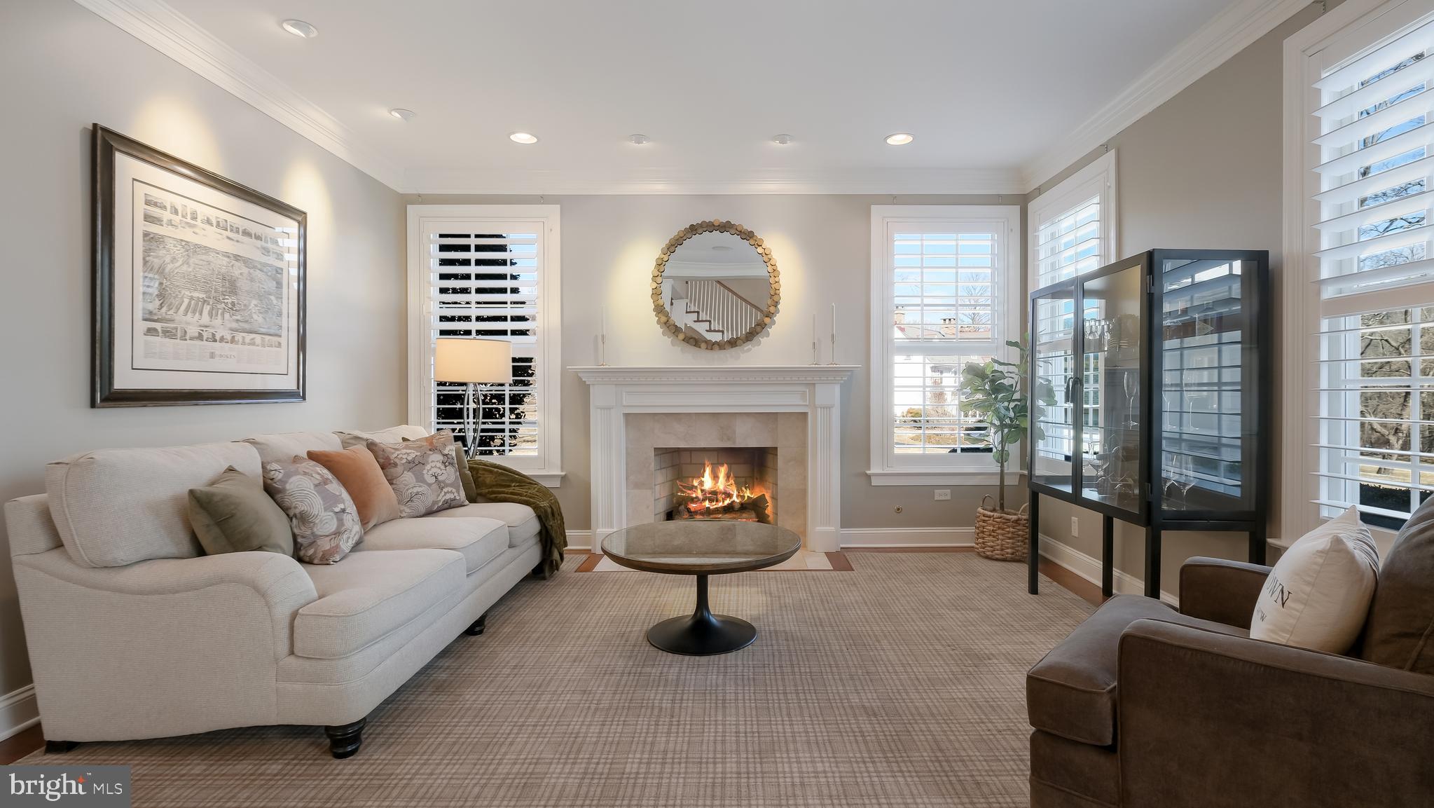 12 Garden Path Doylestown, PA 18901 - Photo 9 of 58 a living room with furniture a fireplace and window