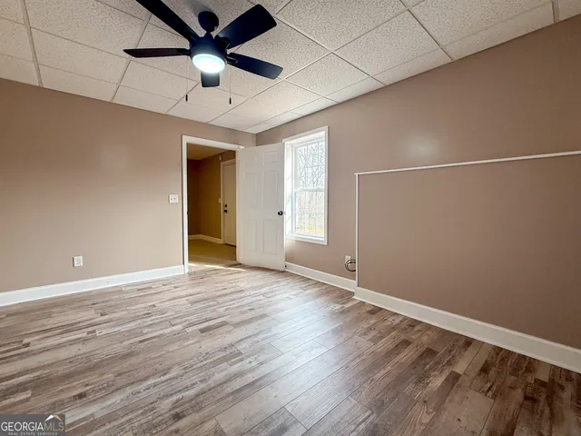 a bathroom with a toilet and shower