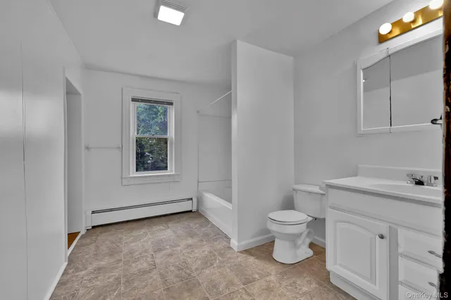 a view of a bathroom with a sink and a toilet
