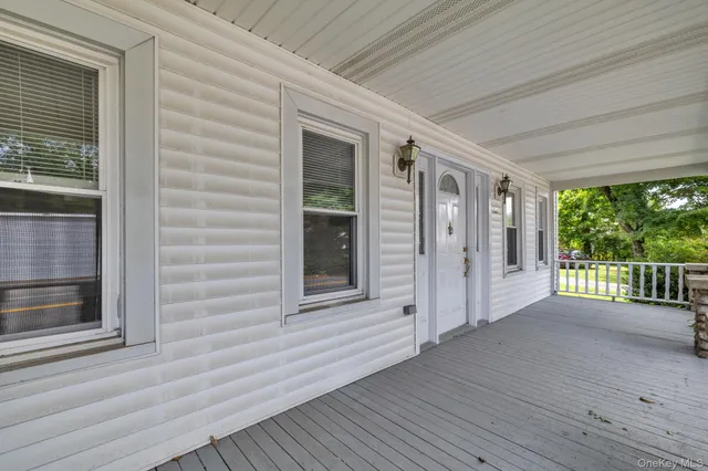 a view of front door and porch