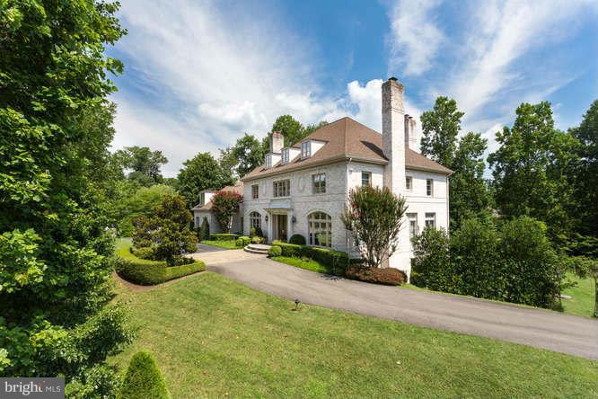 1193 Windrock Drive McLean, VA 22102 - Photo 3 of 30 a view of a house with a yard and potted plants