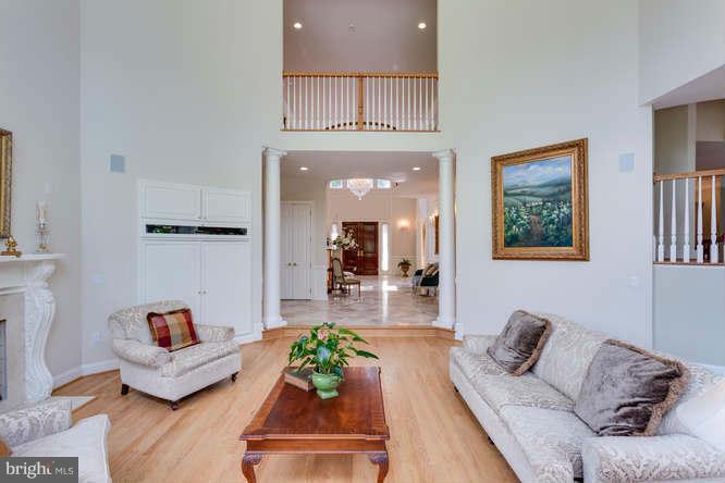 1193 Windrock Drive McLean, VA 22102 - Photo 6 of 30 a living room with furniture and a fireplace