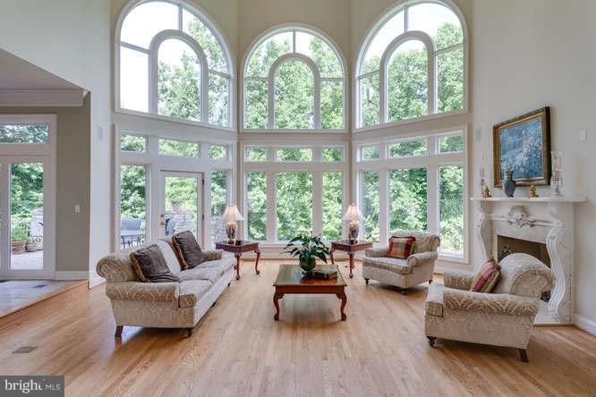 1193 Windrock Drive McLean, VA 22102 - Photo 7 of 30 a living room with furniture fireplace and wooden floor