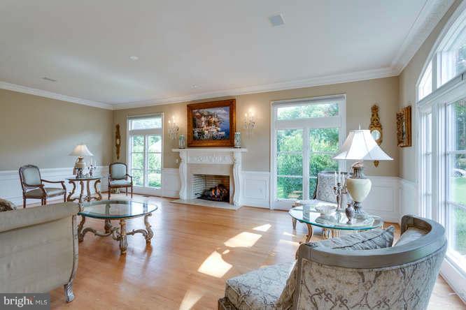 1193 Windrock Drive McLean, VA 22102 - Photo 9 of 30 a living room with furniture and a fireplace