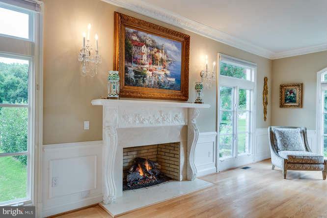 1193 Windrock Drive McLean, VA 22102 - Photo 10 of 30 a living room with furniture and a fireplace