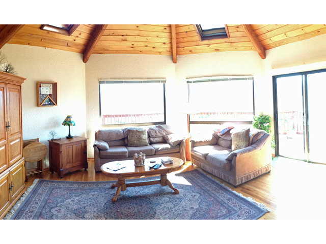 9970 Burchell Road Gilroy, CA 95020 - Photo 6 of 11 a living room with furniture and a large window