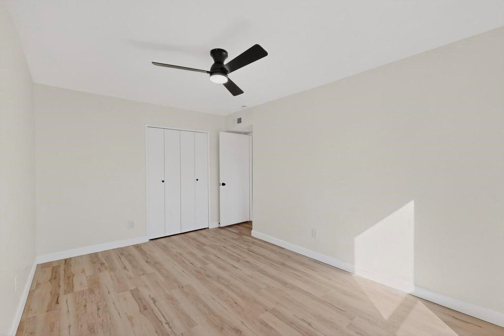 8505 Woodside Road Rowlett, TX 75088 - Photo 32 of 40 a view of empty room with wooden floor