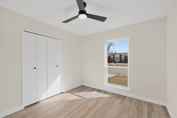 a view of an empty room and window