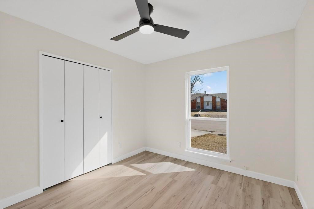 8505 Woodside Road Rowlett, TX 75088 - Photo 33 of 40 a view of an empty room and window
