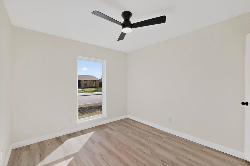 8505 Woodside Road Rowlett, TX 75088 - Photo 34 of 40 a view of an empty room and window