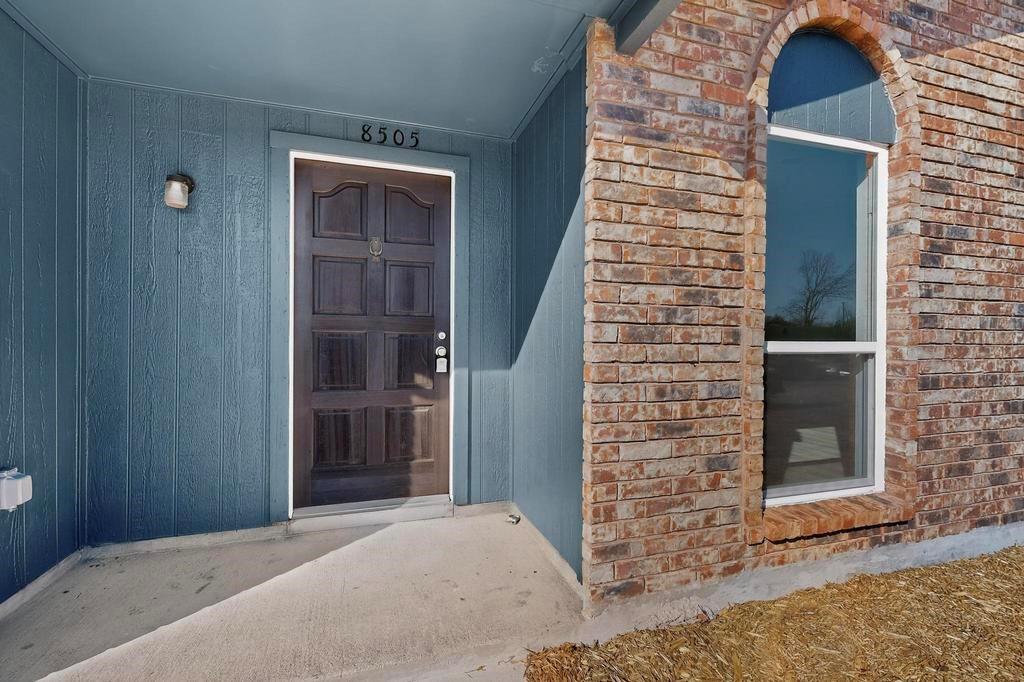 8505 Woodside Road Rowlett, TX 75088 - Photo 5 of 40 a view of front door of house