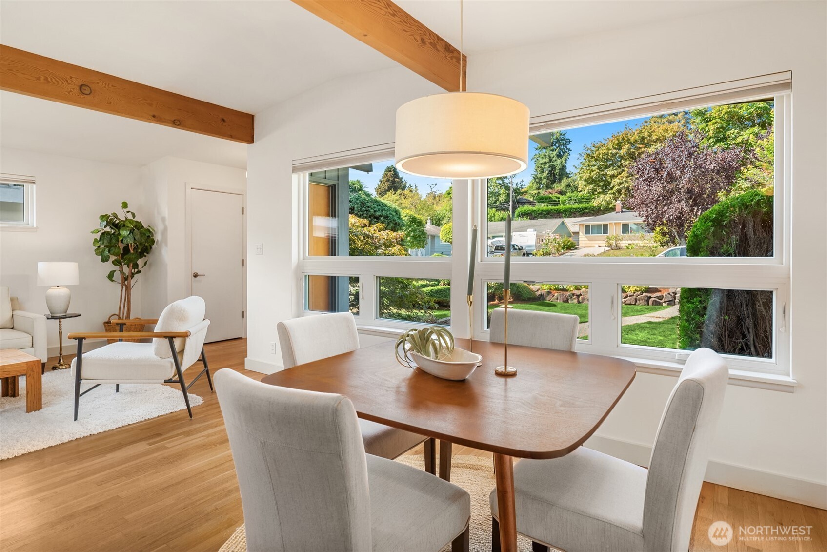 4714 50th Avenue Southwest Seattle, WA 98116 - Photo 11 of 34 a view of a dining room with furniture window and outside view