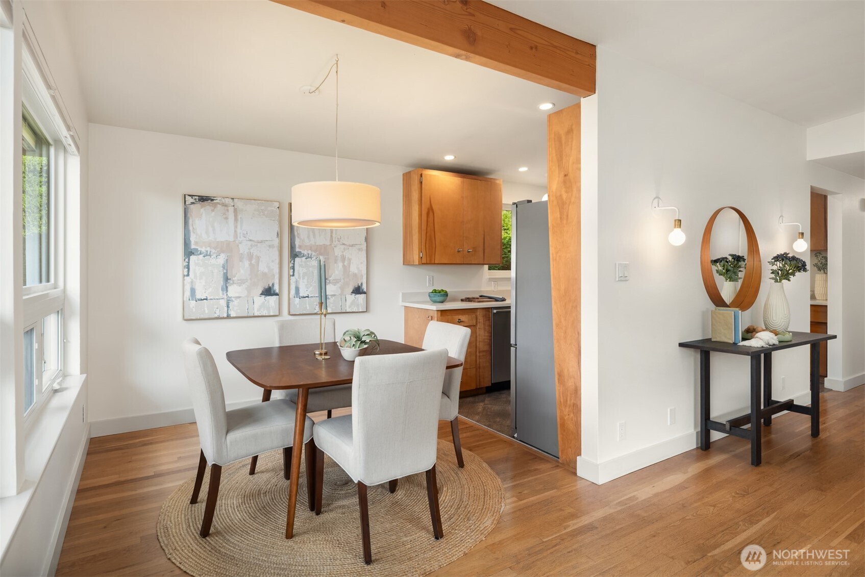 4714 50th Avenue Southwest Seattle, WA 98116 - Photo 12 of 34 a view of a dining room with furniture and window