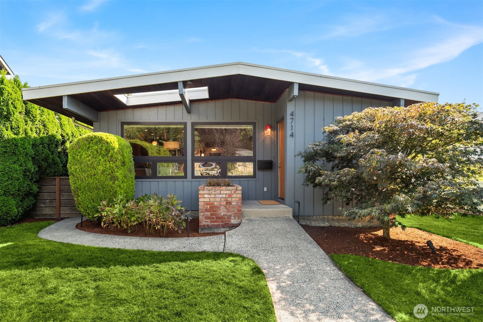 4714 50th Avenue Southwest Seattle, WA 98116 - Photo 2 of 34 a front view of a house