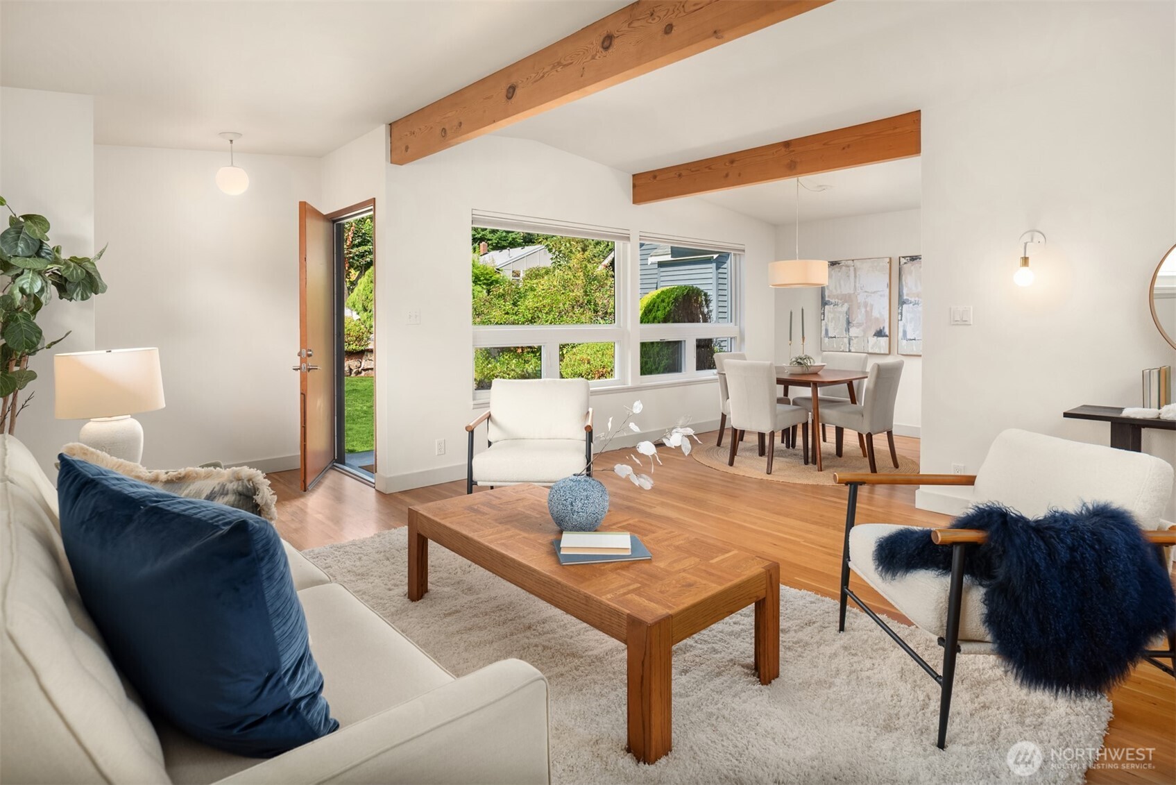 4714 50th Avenue Southwest Seattle, WA 98116 - Photo 8 of 34 a living room with furniture and a large window