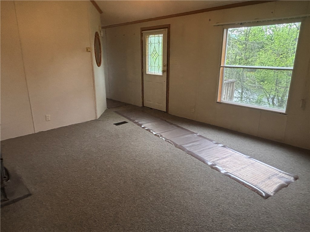 473 County Highway Oneonta, NY 13820 - Photo 13 of 45 Living room with entrance to back deck overlooking