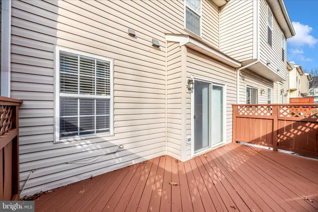 a view of a swimming pool and lounge chairs