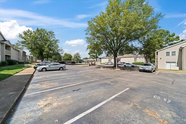 a kitchen with a stove and a microwave