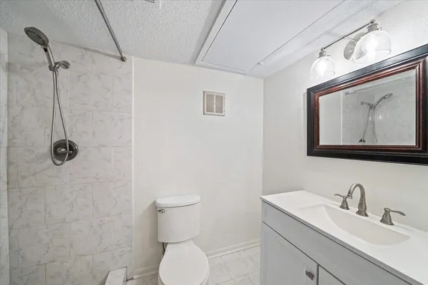 a view of a bathroom with wooden floor
