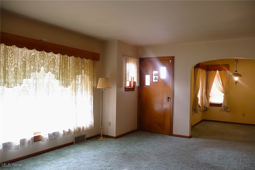 6637 Center Road Ashtabula, OH 44004 - Photo 33 of 44 Spare room featuring carpet and plenty of natural light