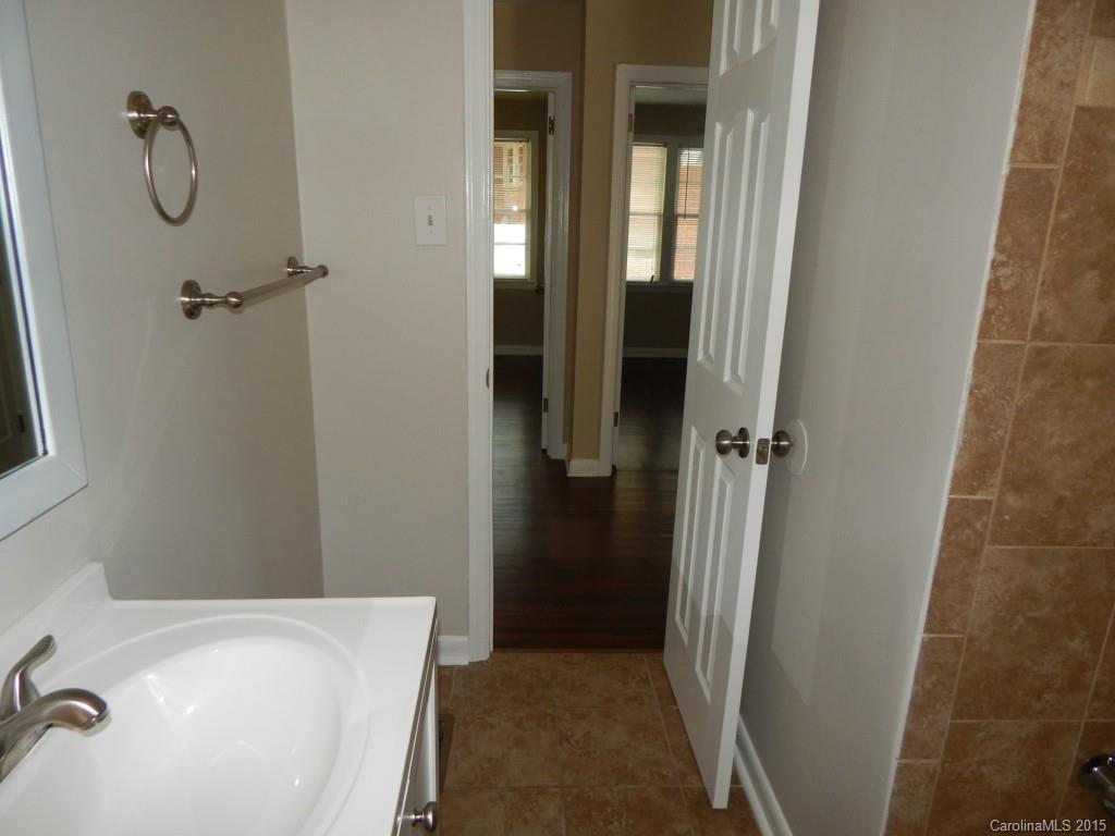 623 Fortune Street Charlotte, NC 28205 - Photo 13 of 15 a bathroom with a tub and sink