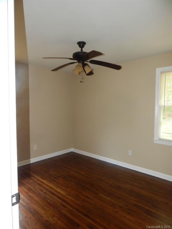 623 Fortune Street Charlotte, NC 28205 - Photo 9 of 15 a view of a room with wooden floor and a window