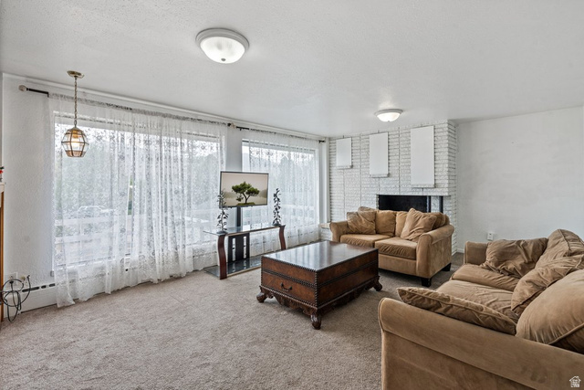 149 West 1600th Street South Mapleton, UT 84664 - Photo 6 of 44 Living room with carpet and a textured ceiling